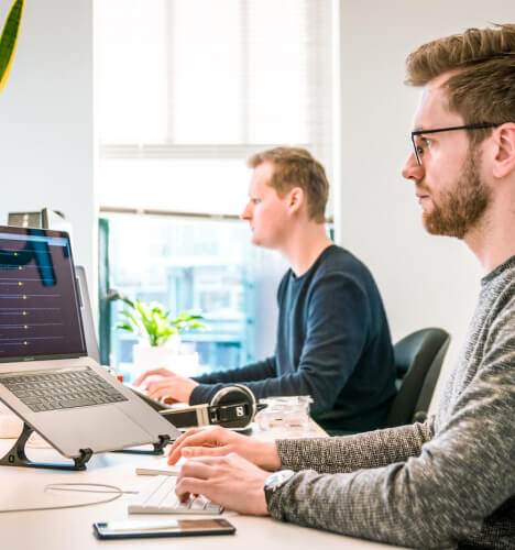 image of people in front of computer