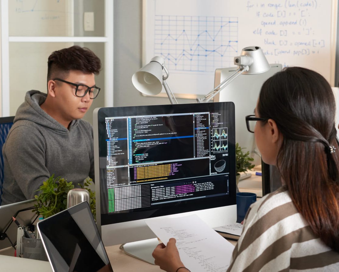 image of people at a computer