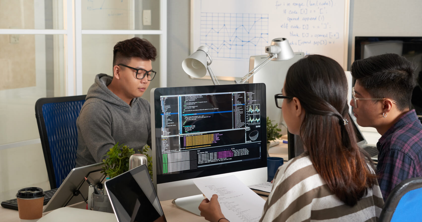 image of people at a computer